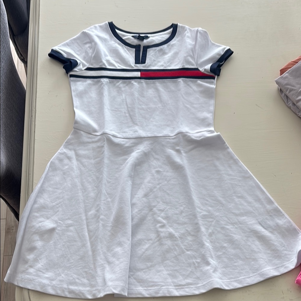 Stylish White Dress with Black and Red Accents